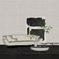 Beige Multi Seater Sofa With Cushions Black And White Abstract Painting And Round Coffee Table