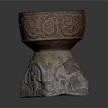Intricate Sculptural Carving Of Decorative Vessel With Detailed Patterns On Stone Base