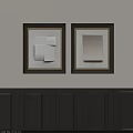 Minimalist Abstract Paintings In Dark Frames With Geometric Shapes On Light Wall