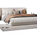 Elegant Double Bed With Beige Upholstered Headboard Multiple Pillows Bedside Tables Gray Rug And Magazine