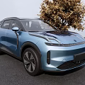 Modern Blue Electric SUV With Sleek Design Parked Near Tree
