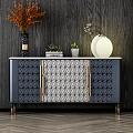Modern Entryway Console Cabinet With Geometric Pattern Metal Handles And Decorative Vase Plant Lamp