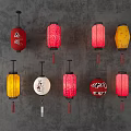 Colorful Traditional Lanterns with Various Patterns Hanging on Gray Wall