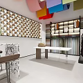 Clothing Store Interior Featuring Colorful Hanging Decor Wooden Wall Art and Display Table with Plants