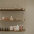 Elegant Modern Bathroom Shelf With Gold Frame Holding Various Skincare And Toiletries Bottles