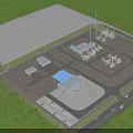 Industrial Plant Site With Multiple Buildings Equipment Parking Lot And Surrounding Trees