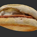 Toasted English Muffin Sandwich with Scrambled Egg Melted Cheese and Sausage
