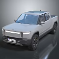 Rivian R1T Electric Pickup Truck With Smooth Front Design LED Headlights And Off Road Tires