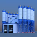 Industrial Concrete Mixing Plant Featuring Blue And White Silos Parked Trucks And Control Building