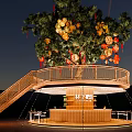 Stylish Wooden Outdoor Bar Under Lantern Decorated Tree With Attached Curved Staircase At Charming Night