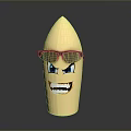 Golden Bullet Shaped Object With Glasses And Cartoon Grinning Face Blue Eyes