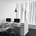 Modern Office Desk With Two Apple Monitors White Chairs Pendant Light And Green Plant