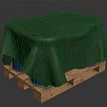 Protective Green Cloth Covered Household Item Placed On Sturdy Wooden Pallet