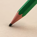 Vibrant Green Pencil With Sharp Black Tip Gently Touching Light Paper Surface 3d model