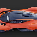 Orange Racing Sports Car With Aerodynamic Features And Sleek Body