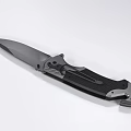 Tactical Folding Knife With Black Textured Handle And Silver Metal Blade