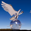Metallic Eagle Sculpture With Spreading Wings On Globe Base Against Blue Sky 3d model
