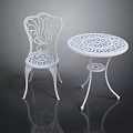 White Ornate Outdoor Furniture Set With Round Table And Carved Chair