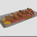 Delicious Pan Fried Dumplings on Gray Rectangular Plate with Lemon Slices and Parsley Garnish