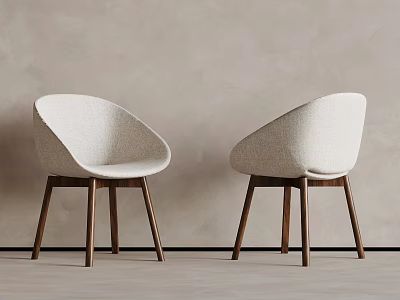 Two Modern Dining Chairs with Beige Upholstered Curved Backrest and Wooden Legs Against Light Wall 3d model