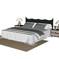 Double Bed With Grey Wooden Wavy Headboard White Sheets Green Blanket And Rattan Nightstands