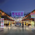 Vibrant Nighttime Commercial Street With Neon Signs Traditional Architecture Pedestrians And Vehicles