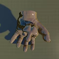 Giant Hand Sculpture With Small Figure Sitting On Top Against Blue Sky Green Field