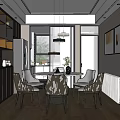 Modern Dining Room Interior With Round Table Chairs Hanging Chandeliers And Framed Paintings
