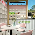 Modern Bookstore Interior With Pink Chairs Round Tables White Bookshelves And Green Plants