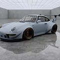 Light Blue Sports Car With Rear Spoiler And Golden Wheels In Empty Indoor Space
