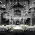 Luxurious Banquet Hall with Crystal Chandeliers Arched Design and White Floral Decorated Stage
