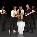 Group of People Interacting Around White Pedestal Table Passing Drinks Using Phones and Cutting Items
