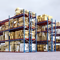Warehouse Storage Racks With Multiple Levels Stacked Boxes And Blue Frames