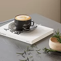 Cup of Latte on Cafe Book with Rosemary in Wooden Bowl on Dark Table