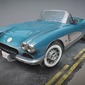 Blue Vintage Classic Convertible Car With Round Headlights On Road