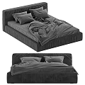 Modern Gray Upholstered Double Bed With Soft Pillows And Wrinkled Duvet