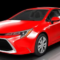 Red Toyota Sedan With Shiny Red Exterior And Modern Front Design