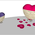 Pink And Purple Heart Shaped Sculptures With Intricate Word Carvings And Scattered Heart Cards