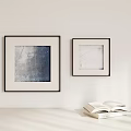 Minimalist Wall Frames With Abstract Art Hanging On White Background And Open Book 3d model