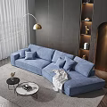 Blue Irregular Shaped Sofa In Modern Living Room With Floor Lamp And Gray Walls