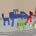 Children's Blue Table and Multi Colored Chairs Set with Toys in Kids Room