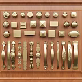 Various Decorative Brass Handles Featuring Different Shapes and Designs 3d model