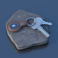 Practical Daily Use Keychain With Round Emblem And Metal Keys On Stone Base