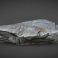 Natural Gray Stone With Textured Surface And Yellow Specks As Raw Decorative Material