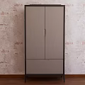 Modern Storage Cabinet With Gray Double Doors And Drawer Against Textured Wall On Wooden Floor