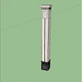 Gray Architectural Column Featuring Decorative Top Vertical Lines In Outdoor Green Landscape And Blue Sky