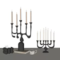 Elegant Black Candelabra with Brown and Purple Candles Minimalist Modern Table Decor