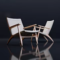 Modern Accent Chairs With Light Wooden Frames And Woven Seats On Dark Reflective Floor