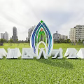 Green Blue White Arch Structure Billboard In Zhuanglang District Renli Park On Grassland With Sky