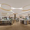 Modern Public Office Space with Multiple Desks Computers Gray Office Chairs Wooden Flooring Circular Lights